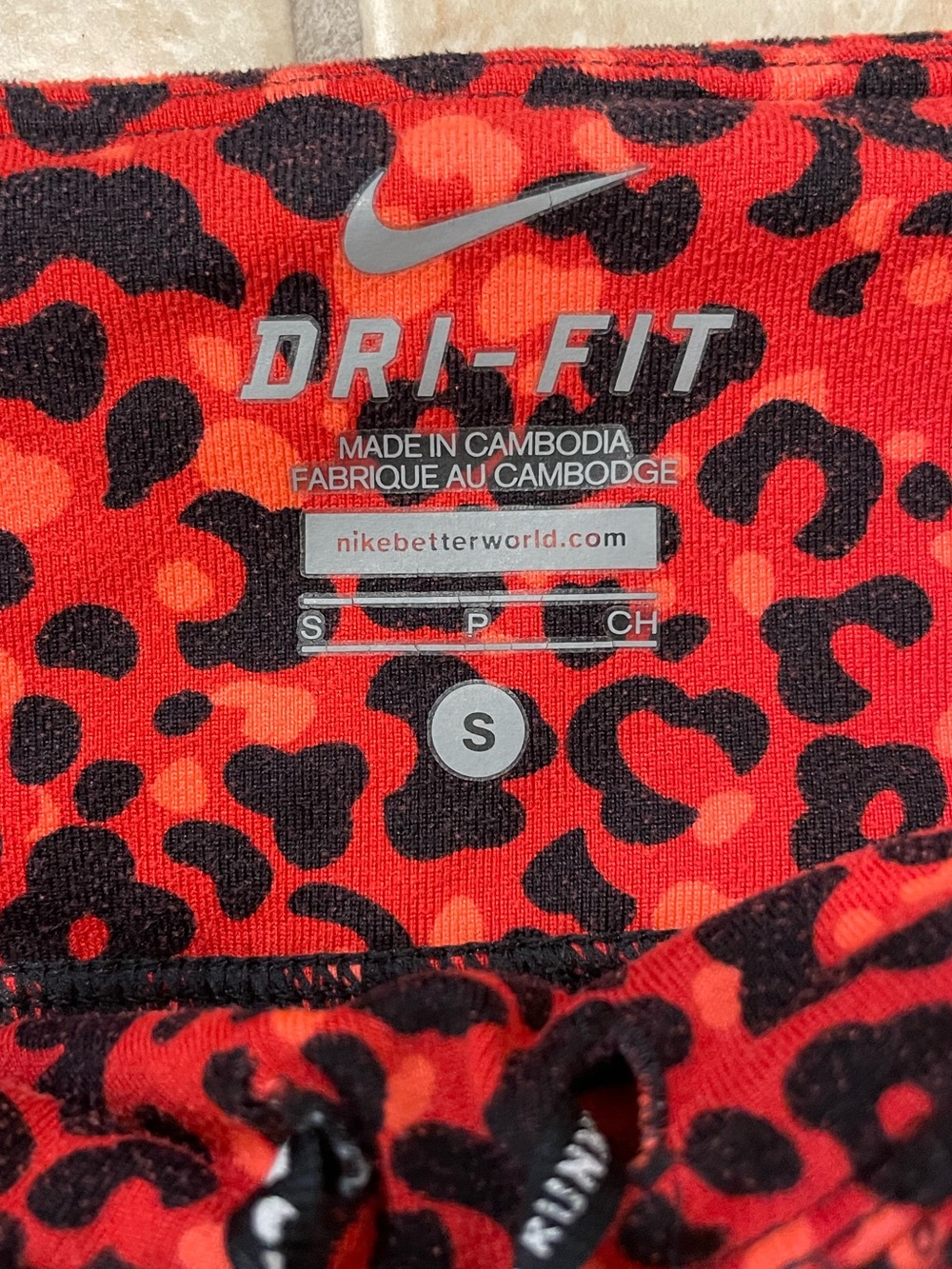 Nike Dri-Fit black & orange Leopard Print Leggings - Picture 2 of 13